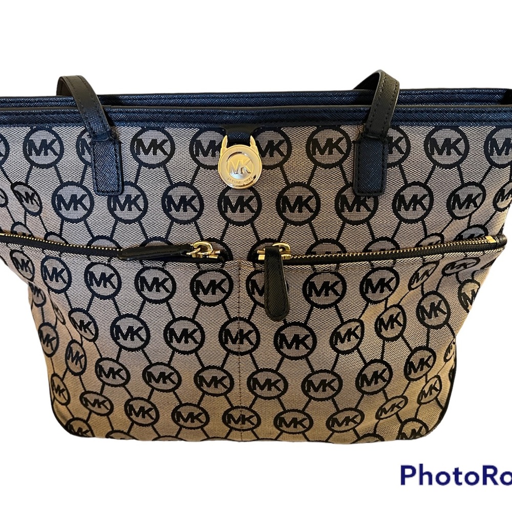 Michael Kors: Black and Tan Shoulder Bag